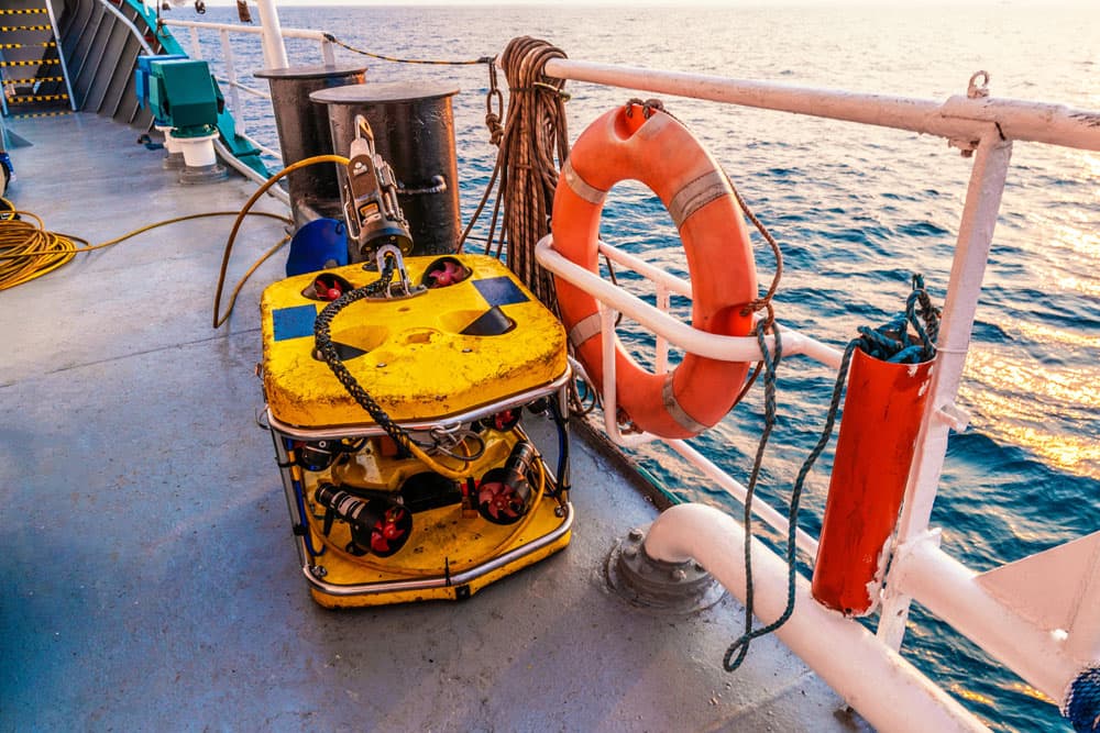 auv on boat deck in the ocean